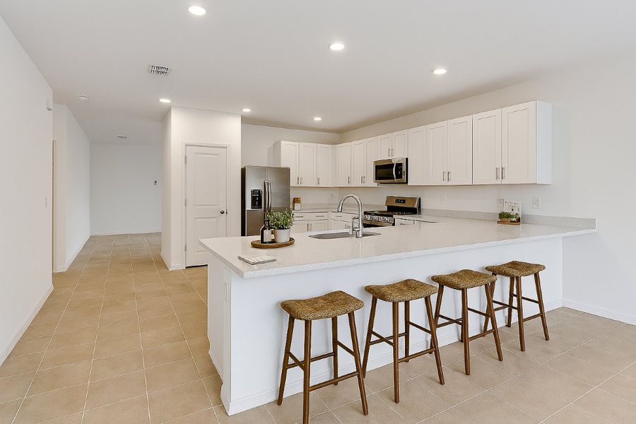 Representative furnished interior of a home built from the Spruce by Taylor Morrison in Waterstone, Groveland (Image 8). Representative furnished interior of a home built from the Spruce by Taylor Morrison in Waterstone, Groveland (Image 8).