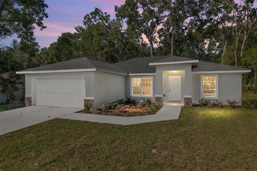 Front exterior of a new home in , Dunnellon, FL, highlighting curb appeal (Image 27).