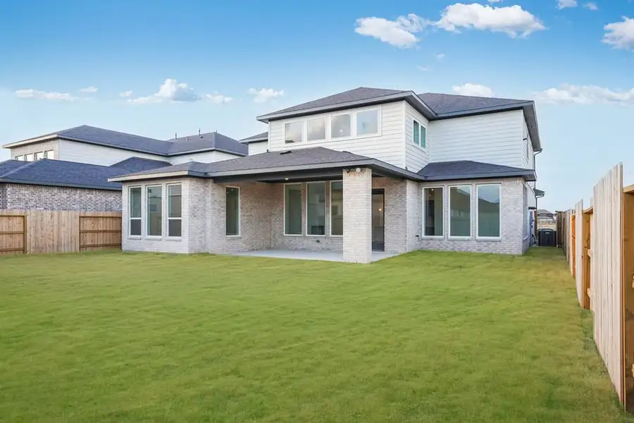 Exterior details and patio area of a home in Avalon at Cypress, Cypress (Image 3).