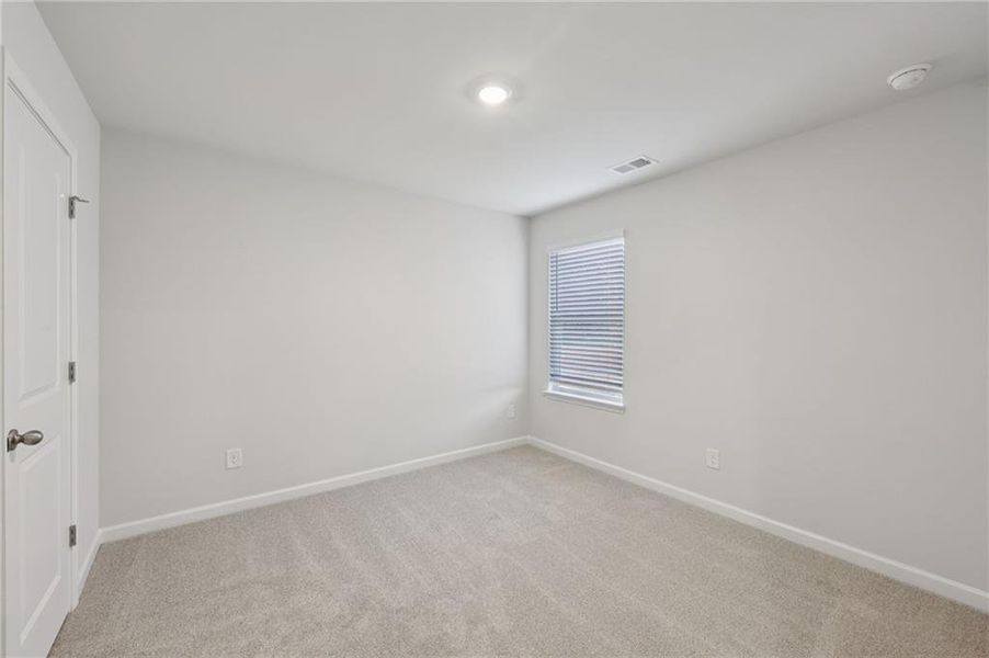 Spacious, unfurnished interior of a new home in Westmont Preserve, Powder Springs (Image 34).