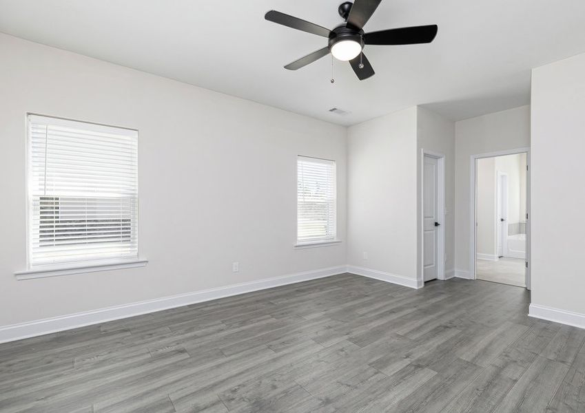 Unwind after a long day in the master bedroom