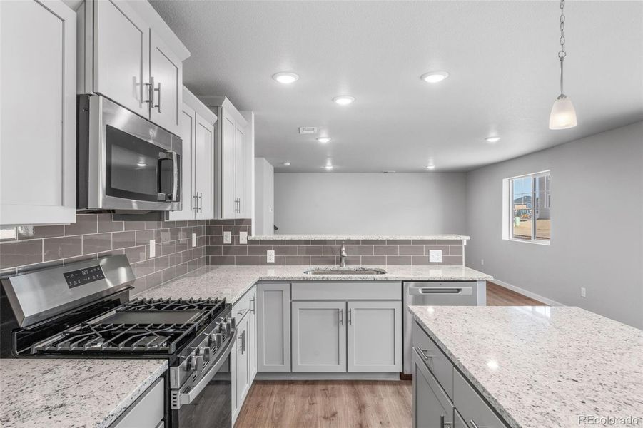 Furnished interior view inside a new home in Sky Ranch – Uptown Collection, Watkins (Image 9).