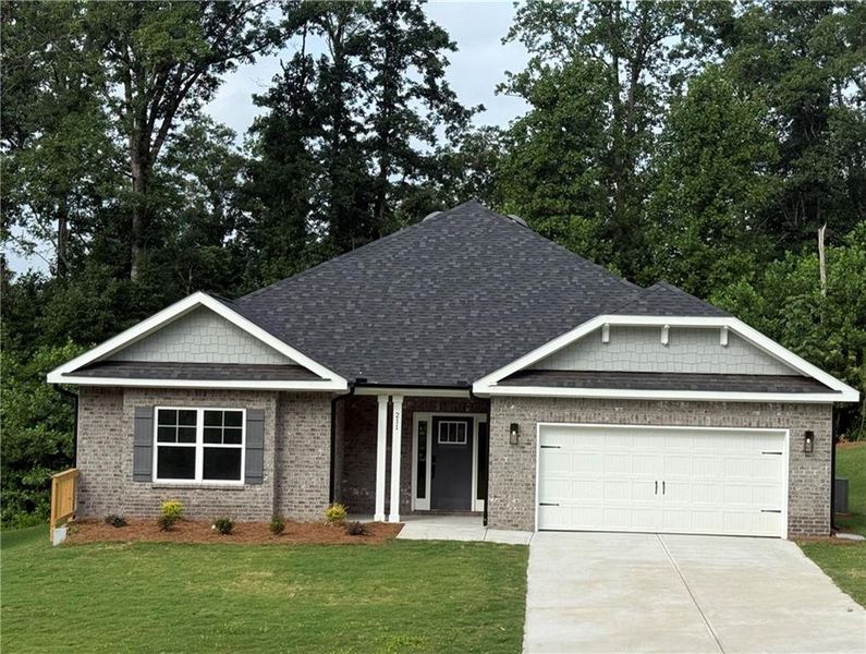 Front exterior of a new home in Thunder Ridge, Dawsonville, GA, highlighting curb appeal (Image 23).