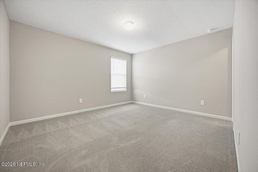 Spacious, unfurnished interior of a new home in Cordova Palms, St. Augustine (Image 17).
