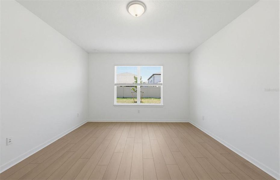 Spacious, unfurnished interior of a new home in Vida's Way, Wesley Chapel (Image 10).