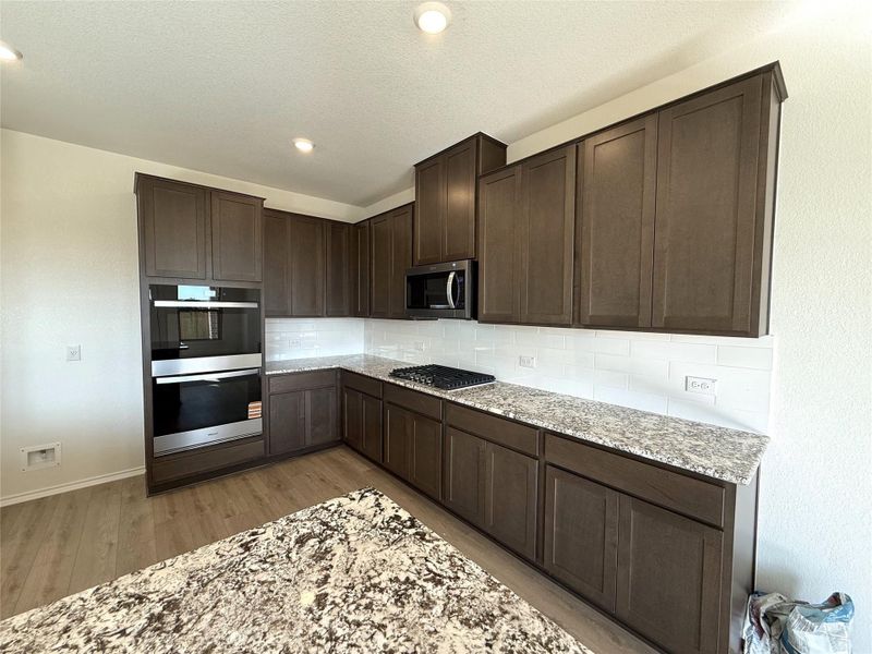 Furnished interior view inside a new home in River Bluff, Leander (Image 5).