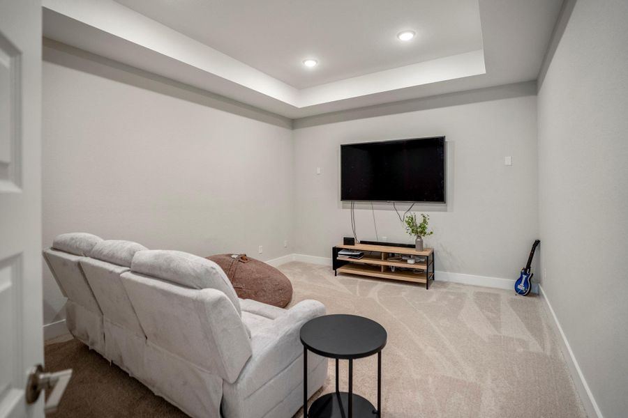 Grab the popcorn, settle in and press play. This dedicated media room is ready for movie marathons, binge-worthy favorites and cozy nights at home.