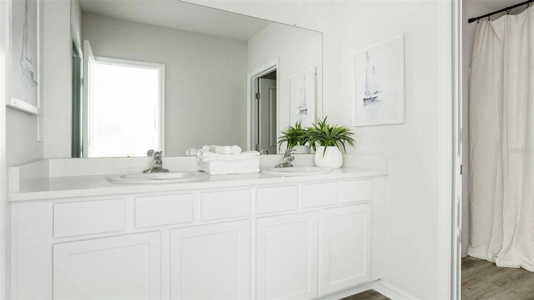 Furnished interior view inside a new home in The Gardens at Bay Street, Sarasota (Image 9).