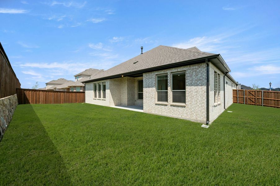 Exterior details and patio area of a home in Westside Preserve, Midlothian (Image 4).