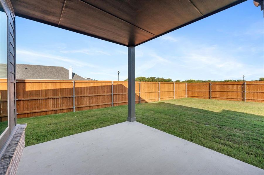 Exterior details and patio area of a home in Northstar, Haslet (Image 21).