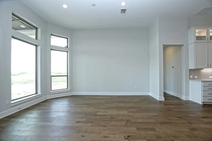 Representative unfurnished interior of a home built from the Llano II by Giddens Homes in Whispering Wind, Bertram (Image 81). Representative unfurnished interior of a home built from the Llano II by Giddens Homes in Whispering Wind, Bertram (Image 81).