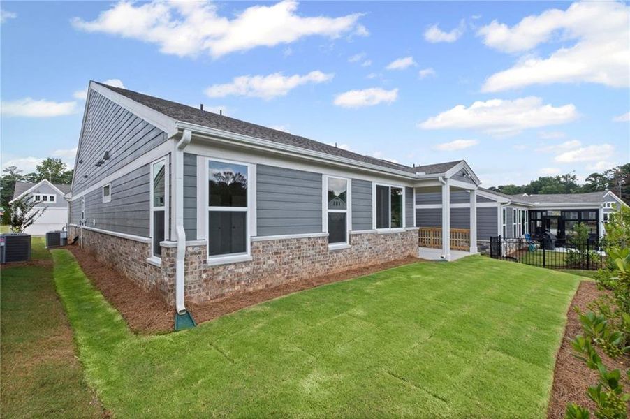 Front exterior of a new home in Laurel Farms, Dallas, GA, highlighting curb appeal (Image 2). Front exterior of a new home in Laurel Farms, Dallas, GA, highlighting curb appeal (Image 2).