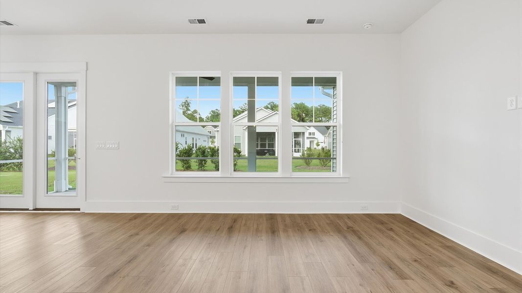 Representative furnished interior of a home built from the Eden by DRB Elevate. in Summerwind Crossing at Lakes of Cane Bay, Summerville (Image 10).