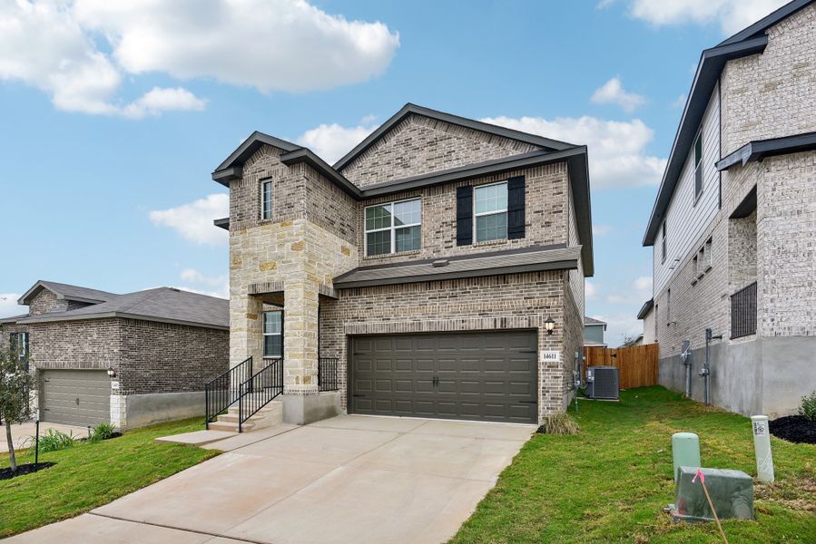 Front exterior of the Red River floorplan at a Meritage Homes community.