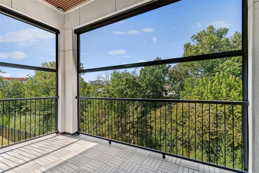 2nd floor balcony with epic views and auto shades with wind sensor, along with Trex flooring and ceiling accent w fan