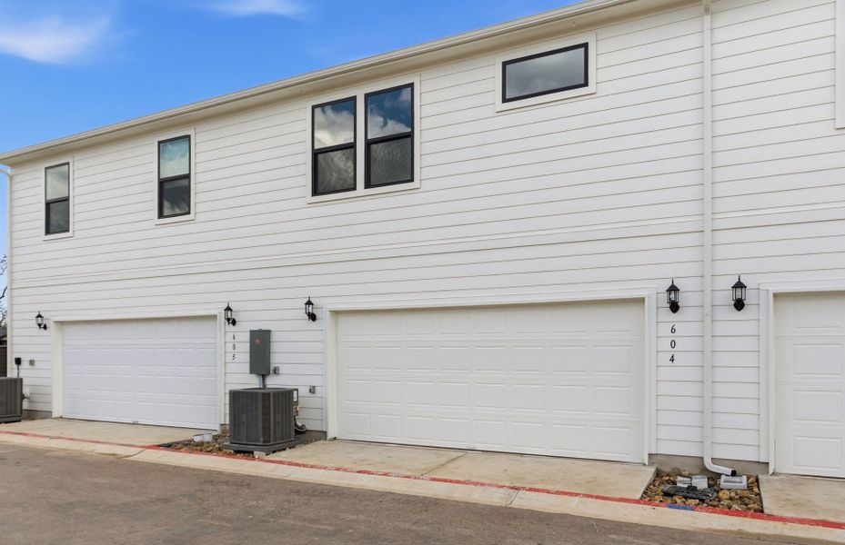 Exterior details and patio area of a home in Monarch on Main, Round Rock (Image 20).