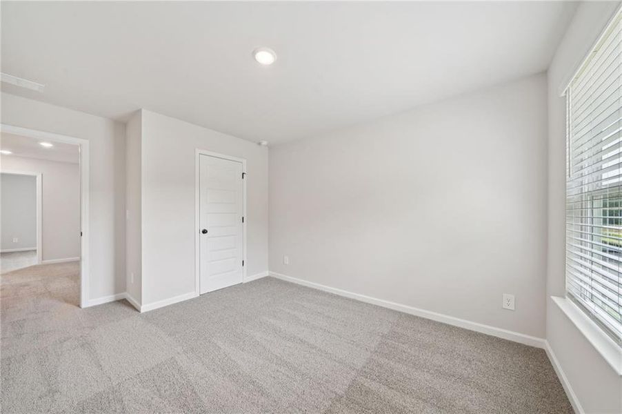 Spacious, unfurnished interior of a new home in Vines at Mill Creek - Estate Series, Braselton (Image 30).