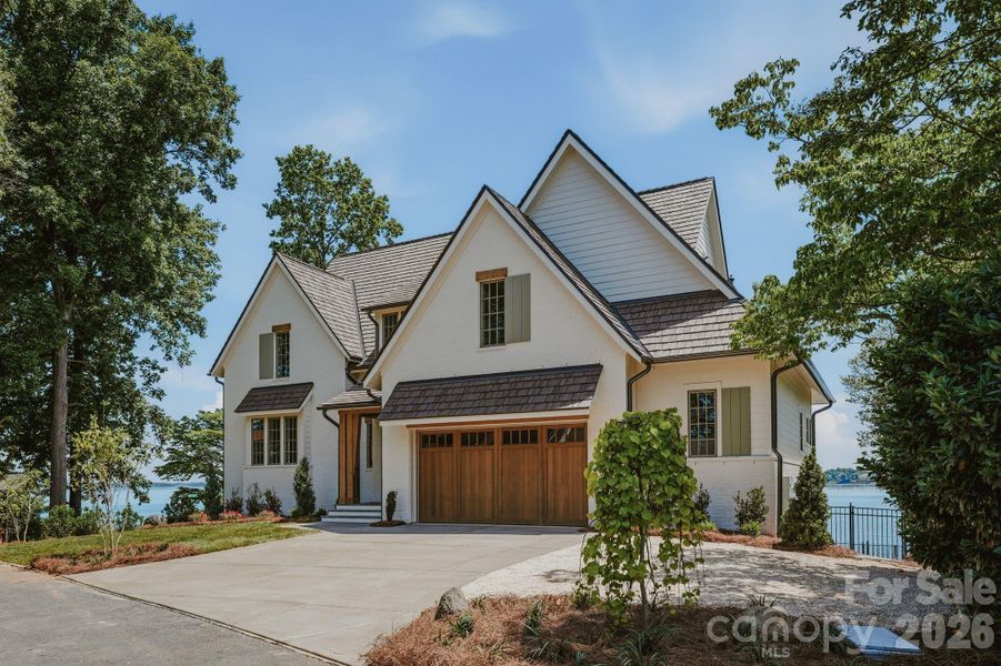 Front exterior of a new home in , Denver, NC, highlighting curb appeal (Image 24).