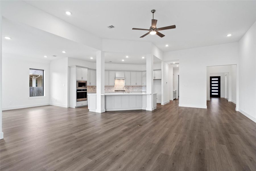 Whether you are relaxing in the great room or greeting guests at the front door, the open sightlines ensure that everyone feels connected, fostering a truly inclusive living experience where isolation is a thing of the past.