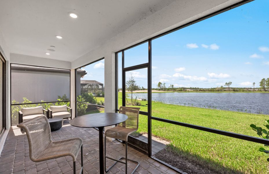 Exterior details and patio area of a home in Arbor Oaks, North Port (Image 3).