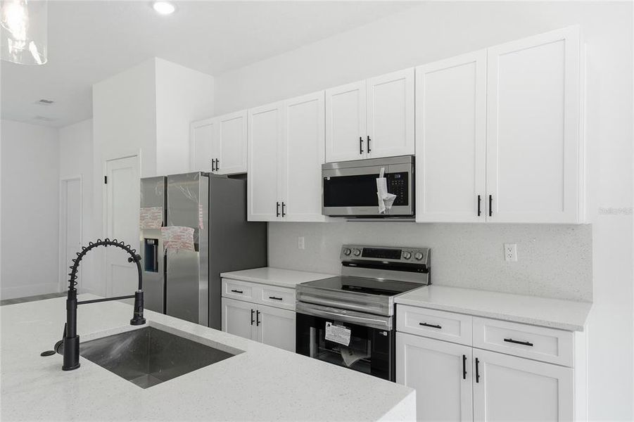 Furnished interior view inside a new home in , Dunnellon (Image 9).