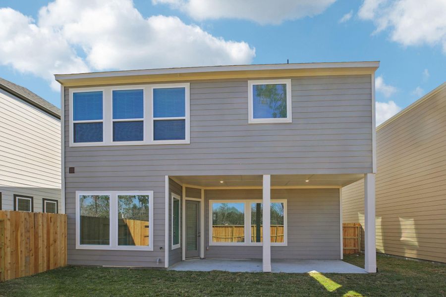Exterior details and patio area of a home in Pinewood Trails - Luxe Series, Houston (Image 27).