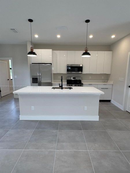 Furnished interior view inside a new home in , Lehigh Acres (Image 5).