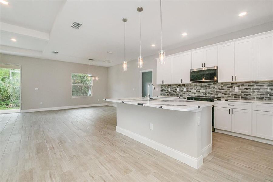 Furnished interior view inside a new home in , Port Charlotte (Image 9). Furnished interior view inside a new home in , Port Charlotte (Image 9).