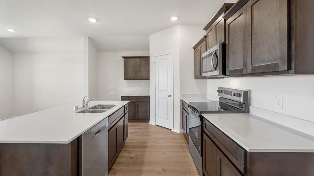 Furnished interior view inside a new home in Creeks at Burnett Trail, Canton (Image 6). Furnished interior view inside a new home in Creeks at Burnett Trail, Canton (Image 6).