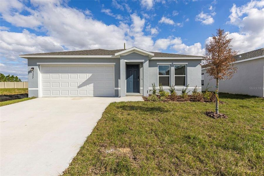 Front exterior of a new home in Scenic Terrace, Lake Hamilton, FL, highlighting curb appeal (Image 1). Front exterior of a new home in Scenic Terrace, Lake Hamilton, FL, highlighting curb appeal (Image 1).