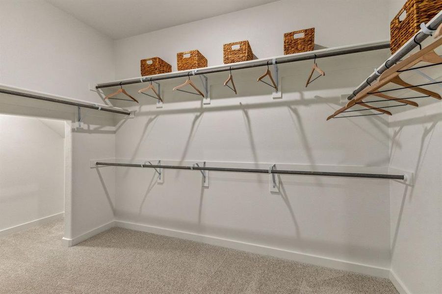Primary Closet in the Stanley II home plan by Trophy Signature Homes – REPRESENTATIVE PHOTO Primary Closet in the Stanley II home plan by Trophy Signature Homes – REPRESENTATIVE PHOTO