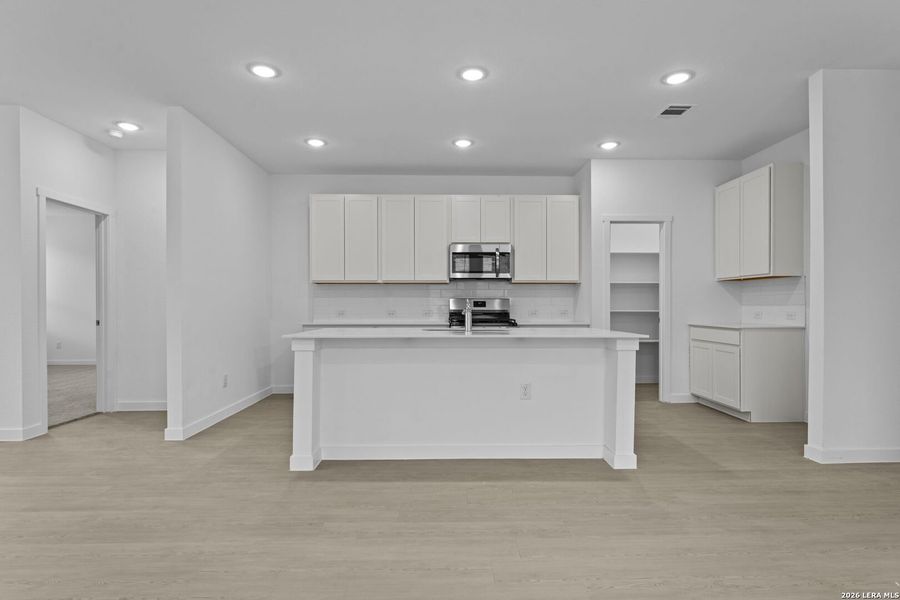 Furnished interior view inside a new home in Sky Ranch, New Braunfels (Image 5).
