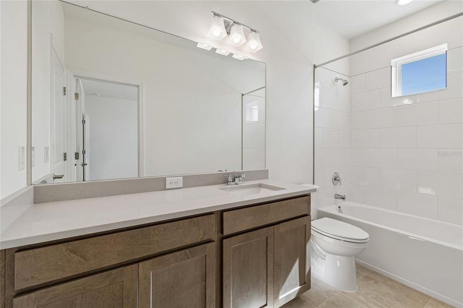 Furnished interior view inside a new home in Waterset Townhomes, Apollo Beach (Image 14).