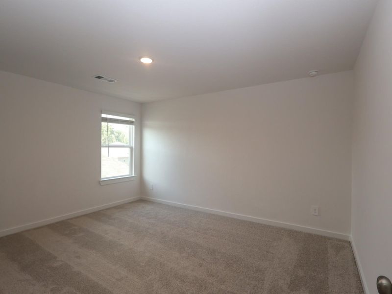 Spacious, unfurnished interior of a new home in Pinewood at Grand Texas, New Caney (Image 20).