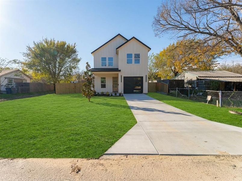 Front exterior of a new home in , Dallas, TX, highlighting curb appeal (Image 16).