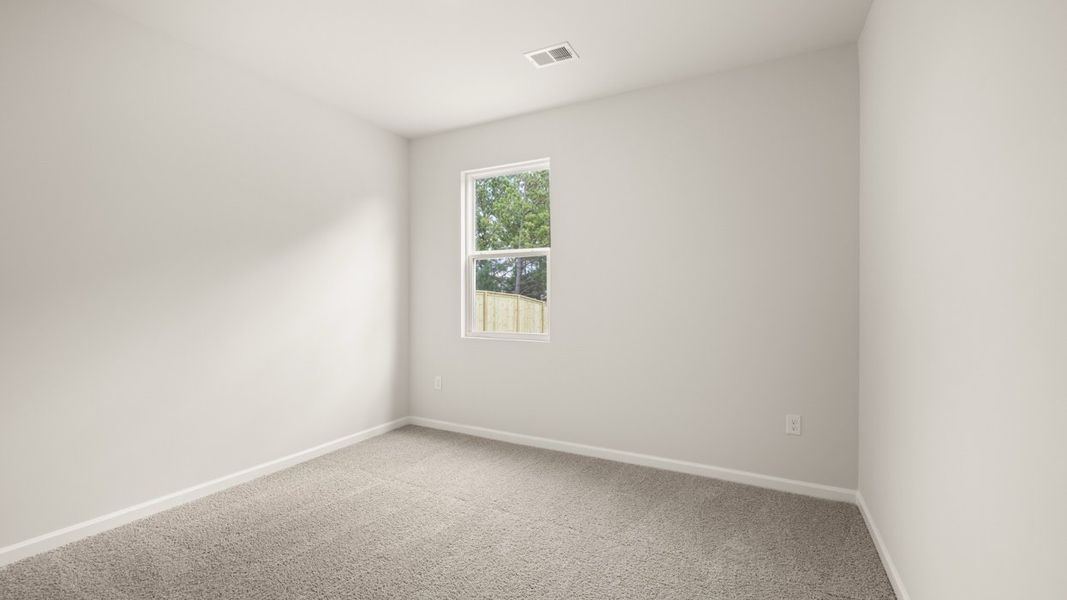 Spacious, unfurnished interior of a new home in Preserve at Dove Creek, Statham (Image 16).