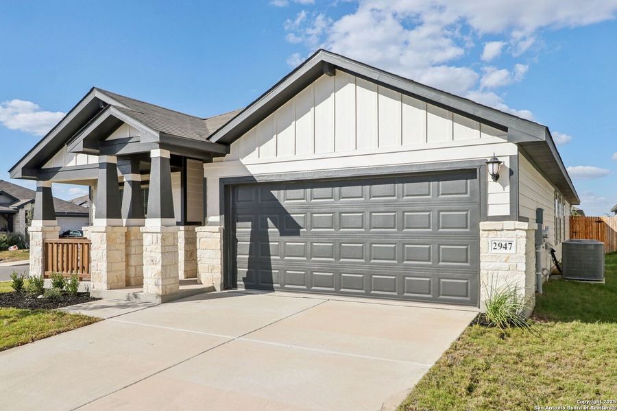 Front exterior of a new home in Catalina, Converse, TX, highlighting curb appeal (Image 22). Front exterior of a new home in Catalina, Converse, TX, highlighting curb appeal (Image 22).