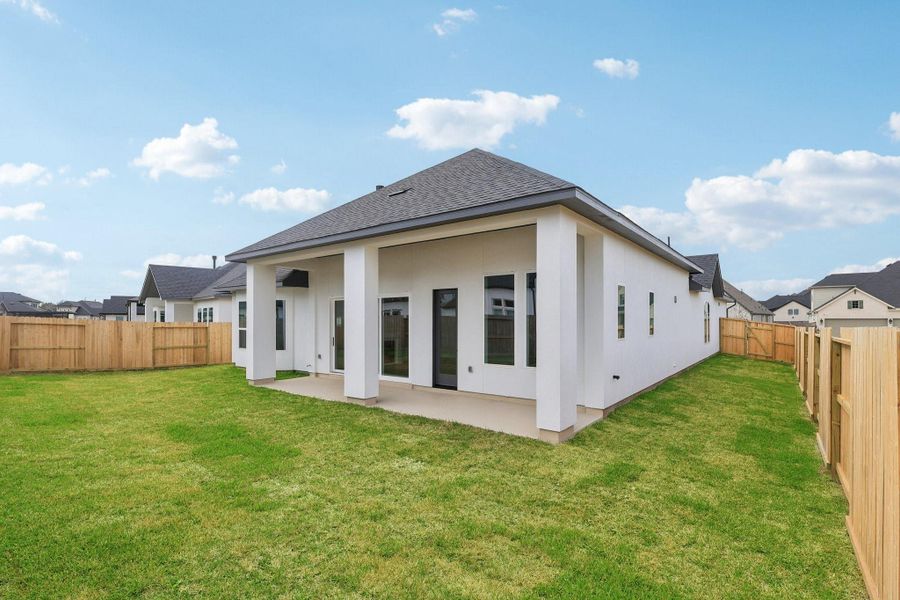 Exterior details and patio area of a home in Sienna 65', Missouri City (Image 18).