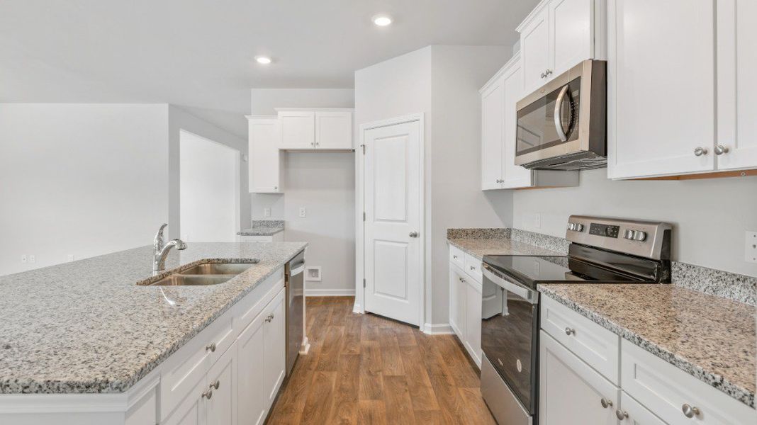 Representative furnished interior of a home built from the CANTEY by D.R. Horton in Rivers Reach, Yemassee (Image 5).