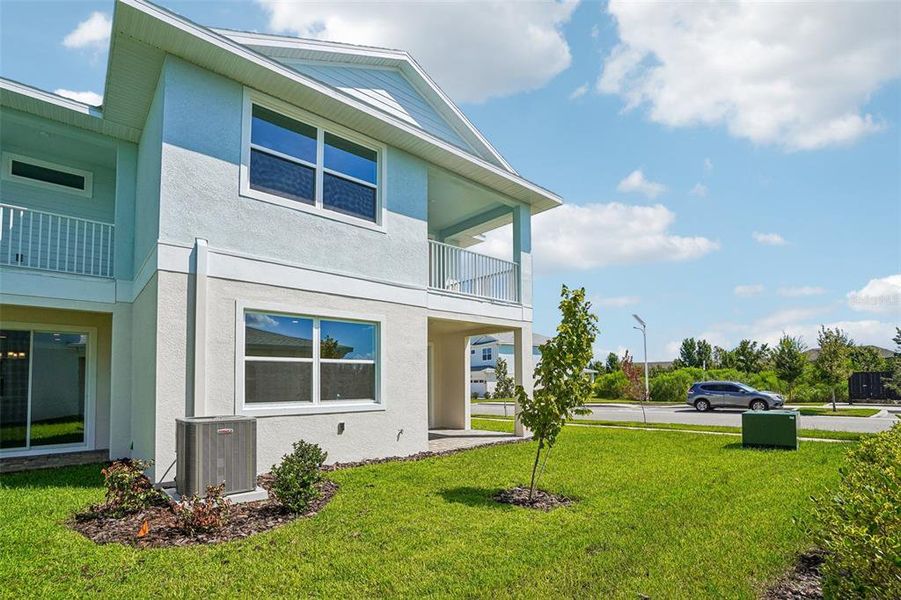 Exterior details and patio area of a home in Lagoon Residences at Epperson, Wesley Chapel (Image 24).