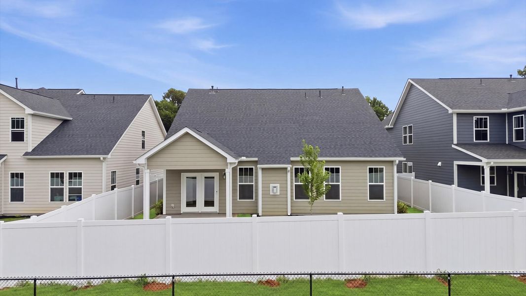 Established charm meets functional outdoor living with a spacious rear covered porch located at Pelham Crossing