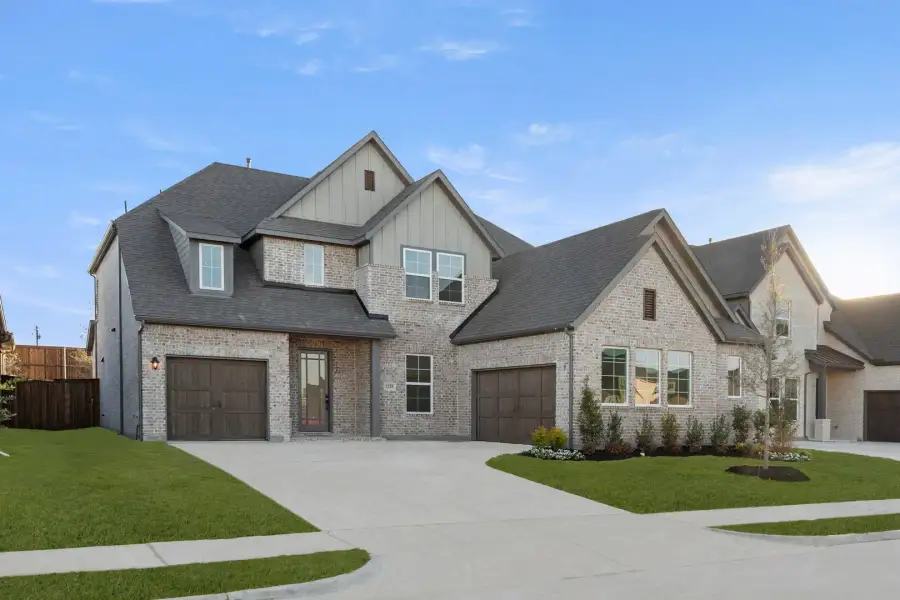 Representative exterior photo of a completed home built from the Edward - 60 ft Home Site by Rockwell Homes in Nelson Lake Estates, Rockwall, TX (Image 28).