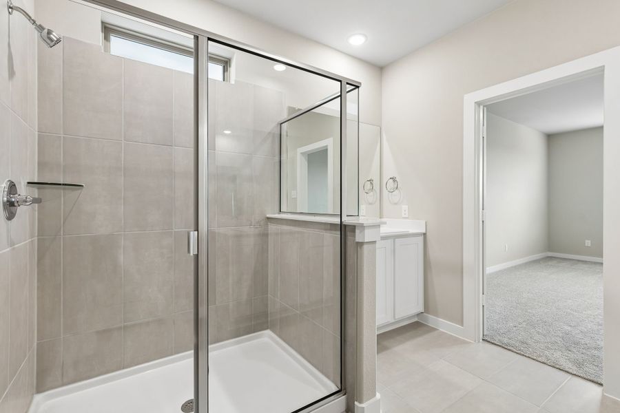 Primary Bathroom in the Winters home plan by Trophy Signature Homes – REPRESENTATIVE PHOTO