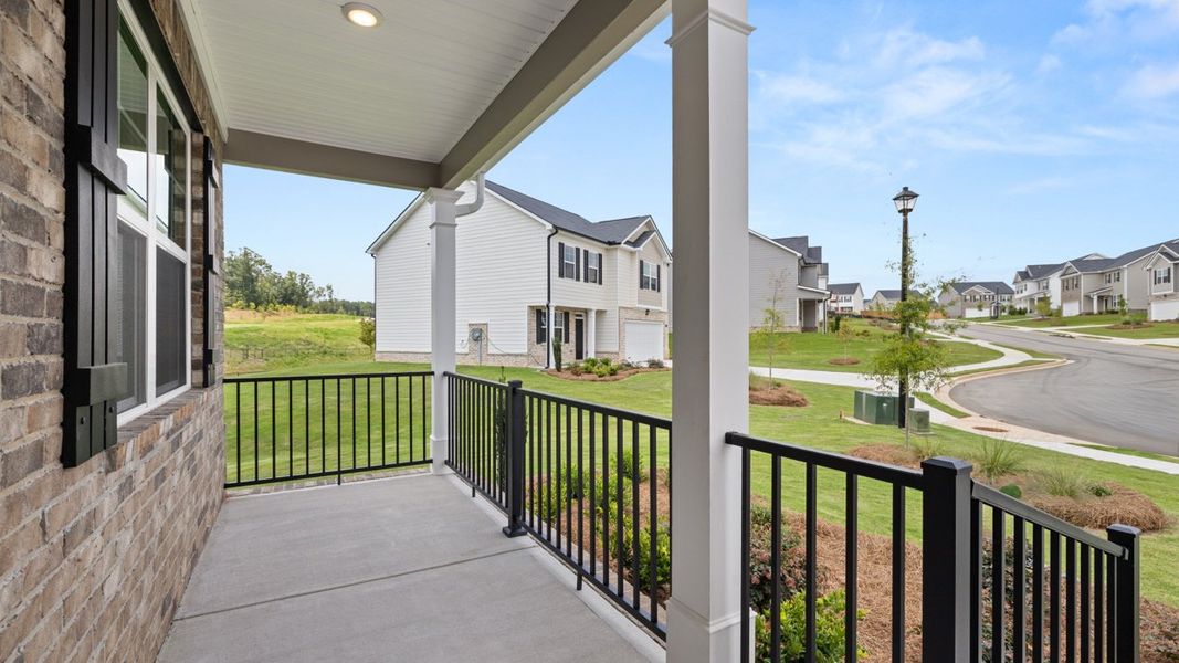 Exterior details and patio area of a home in Locust Grove Station - Cedar Ridge, Locust Grove (Image 3). Exterior details and patio area of a home in Locust Grove Station - Cedar Ridge, Locust Grove (Image 3).