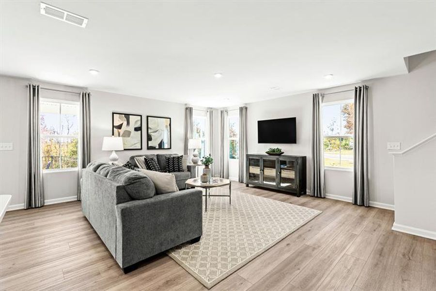 Representative furnished interior of a home built from the Woodford by Ryan Homes in Oakwood Trace, Fairburn (Image 15).