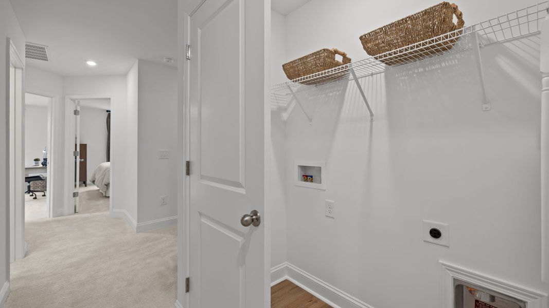 Furnished interior view inside a new home in Leigh Park, Charlotte (Image 17).