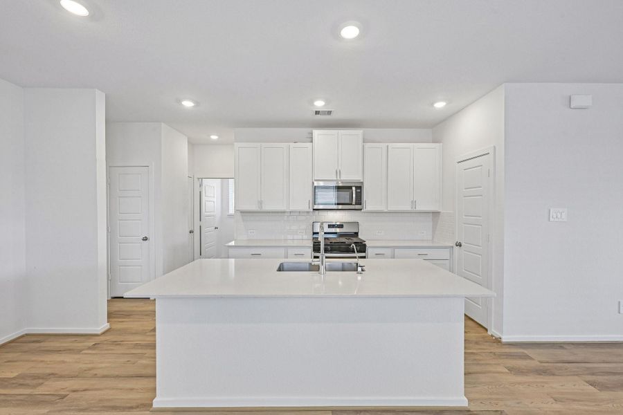 Furnished interior view inside a new home in Riviera Pines - Traditional Series, Huffman (Image 6).