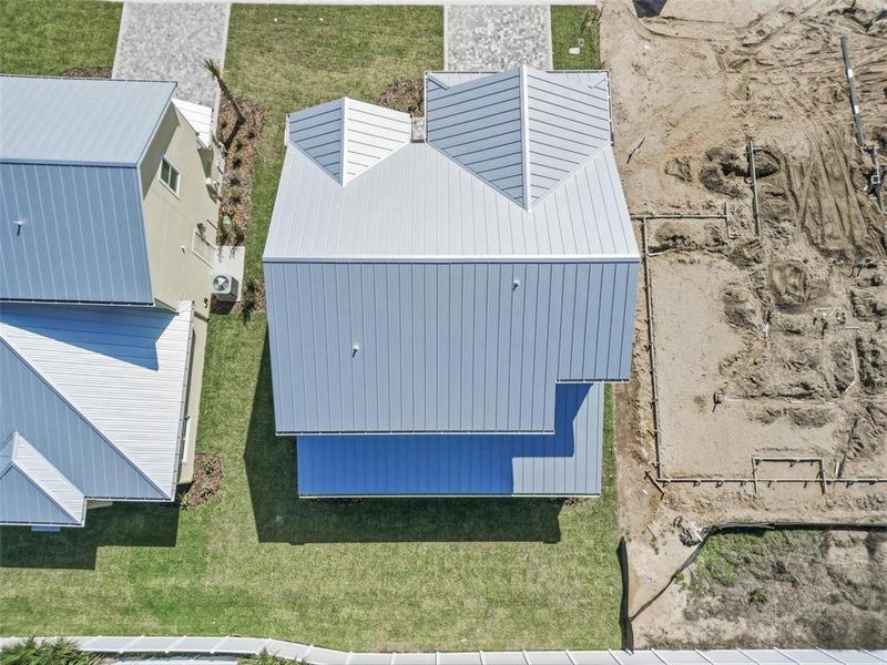 Exterior details and patio area of a home in Beachview Cove, Ormond Beach (Image 3).