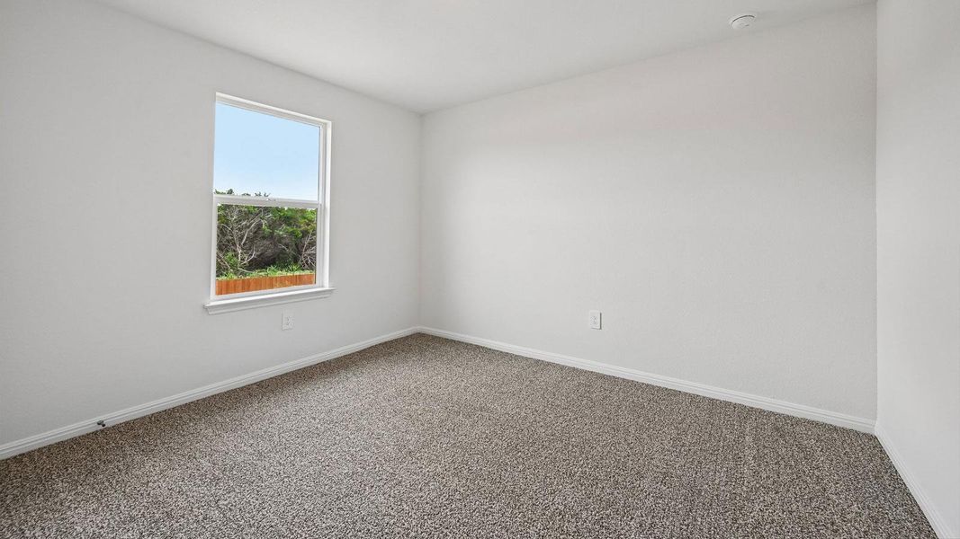 Spacious, unfurnished interior of a new home in Bar W Ranch, Leander (Image 17).