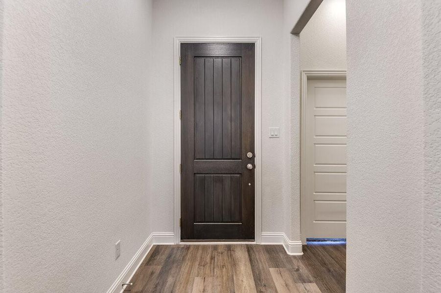 Gorgeous entry with custom front door.